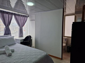 Habitación baño privado y parqueo edificio el Mirador cerca al centro de Manizales Caldas